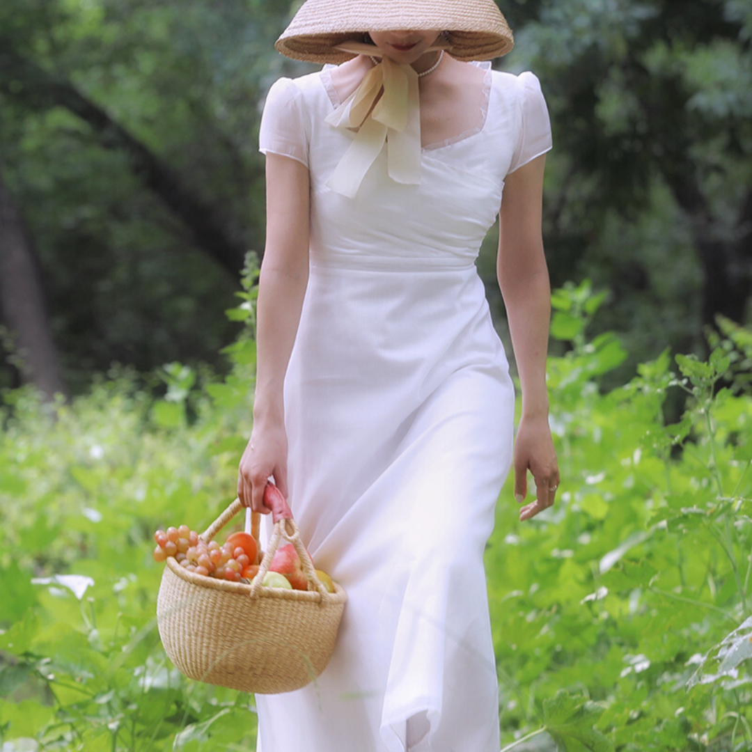 British lady's white vintage dress