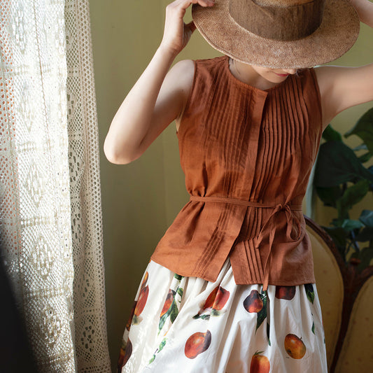 gray brown sleeveless pleated tops