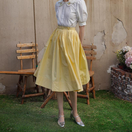 Pale yellow movie actress Hepburn skirt