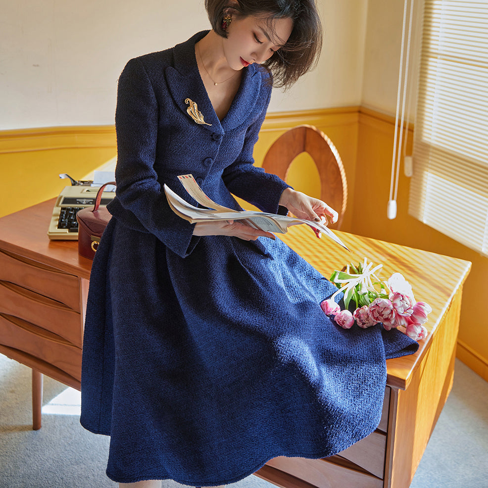 Navy blue actress retro jacket and Hepburn skirt