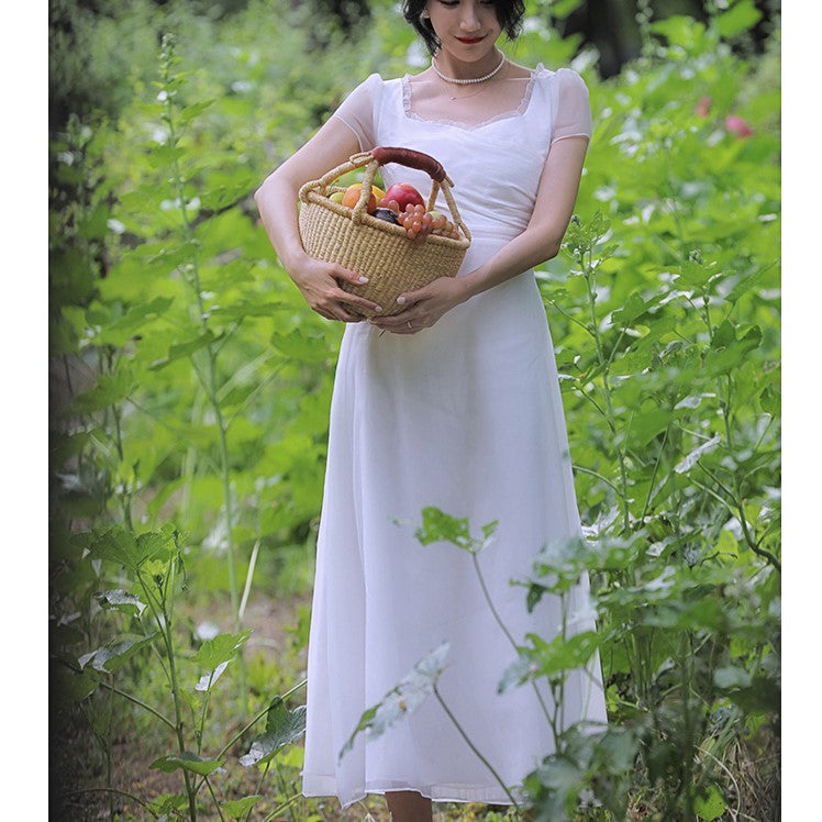 British lady's white vintage dress