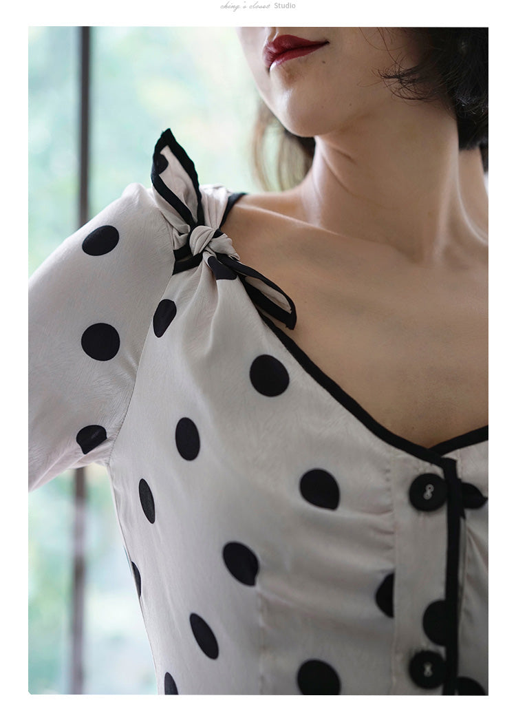 black polka dot fishtail dress