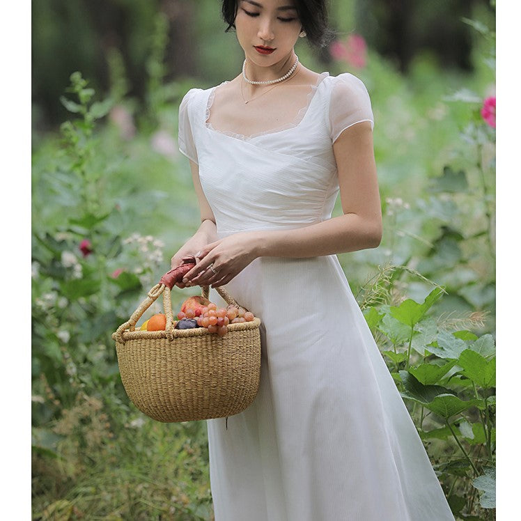 British lady's white vintage dress