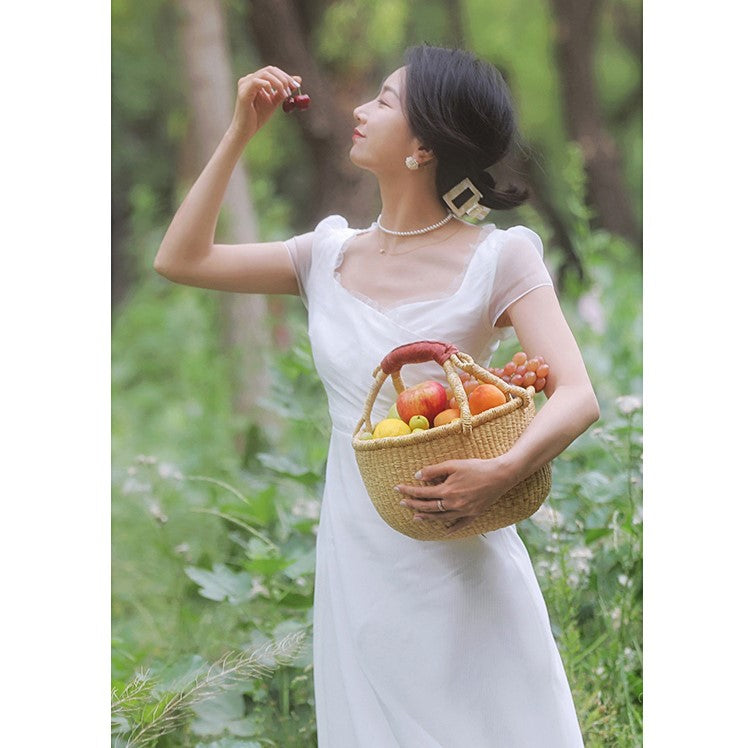 British lady's white vintage dress