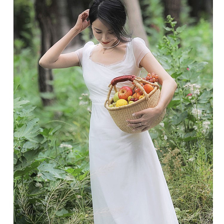 British lady's white vintage dress