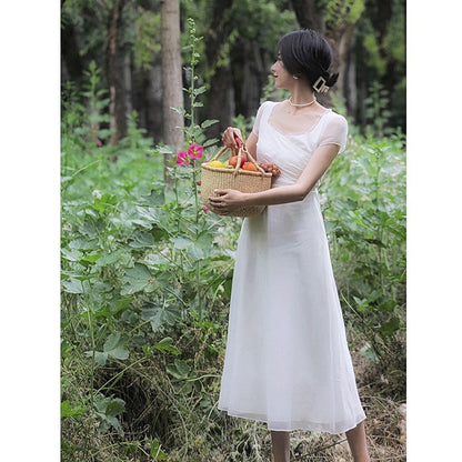 British lady's white vintage dress