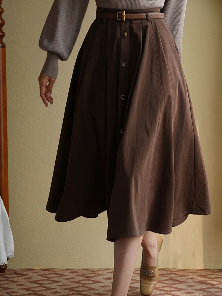 Lady's brown umbrella skirt