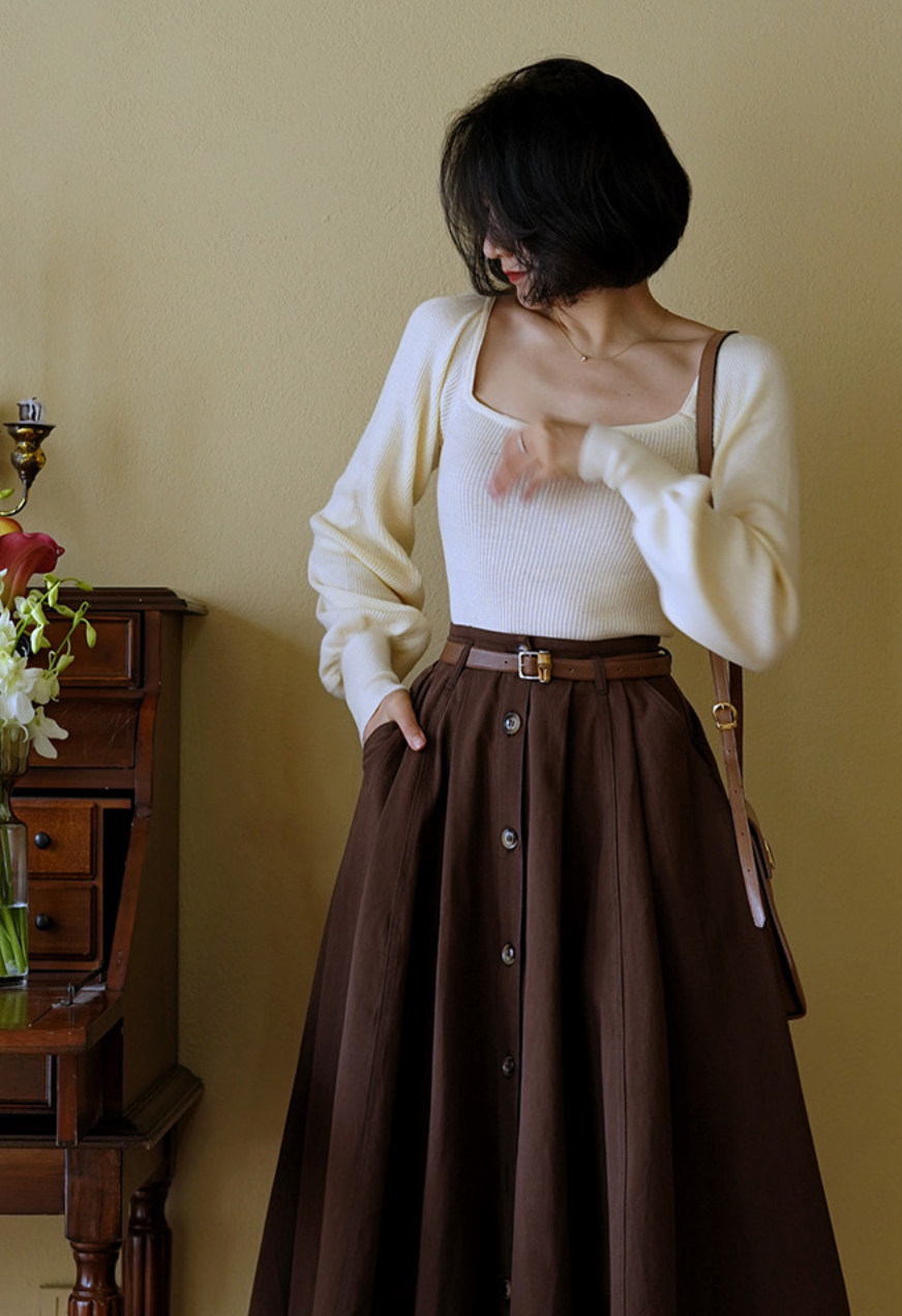 Lady's brown umbrella skirt