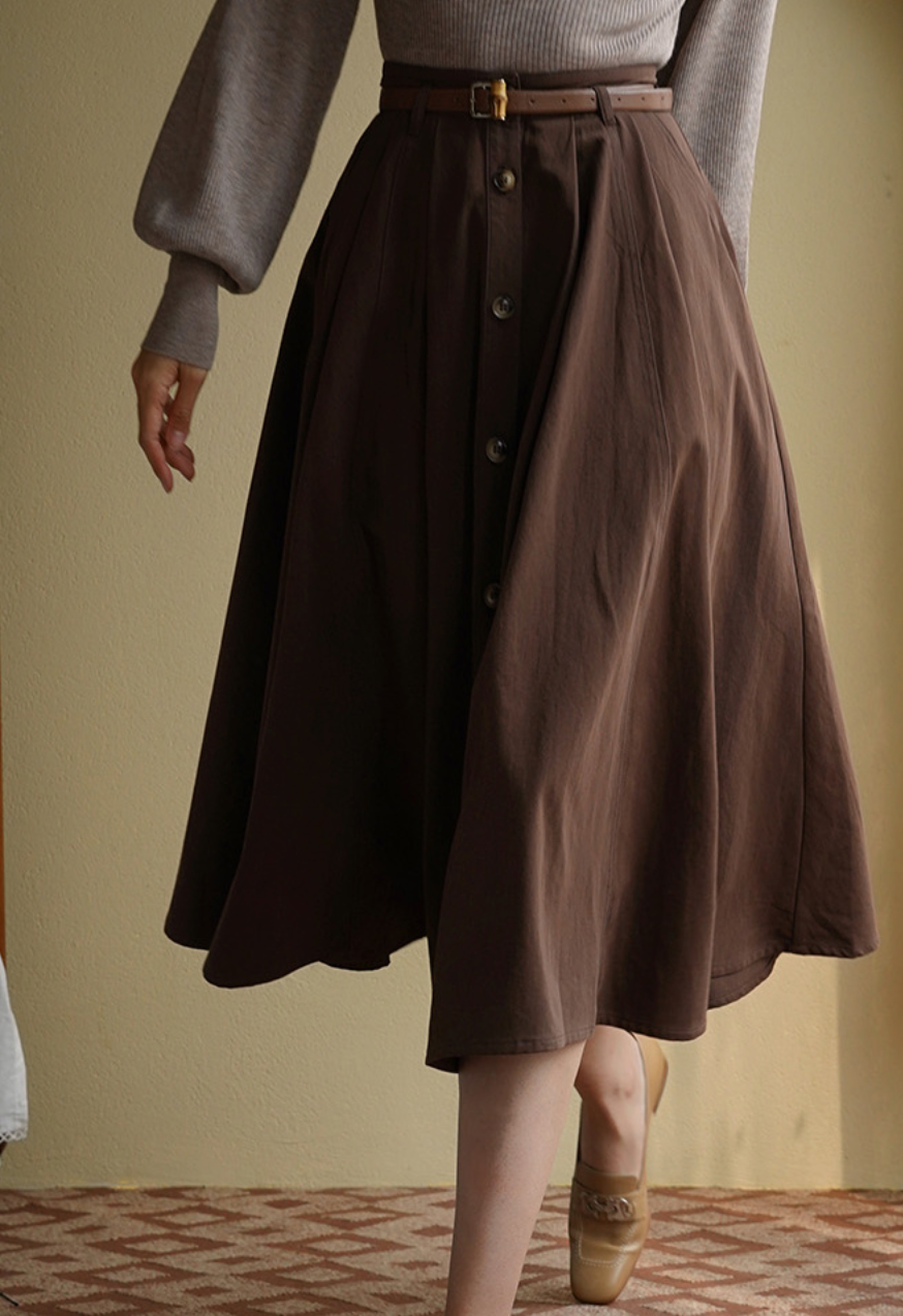 Lady's brown umbrella skirt