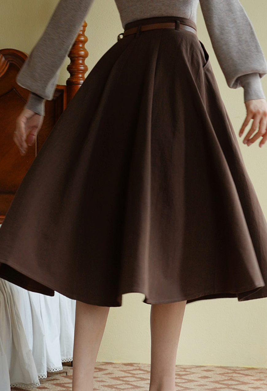 Lady's brown umbrella skirt