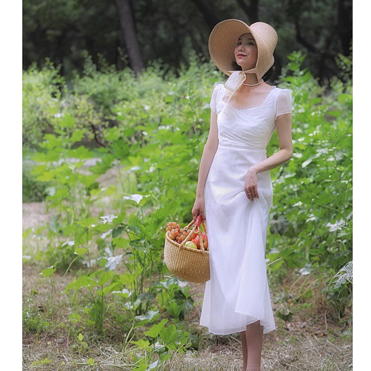 British lady's white vintage dress