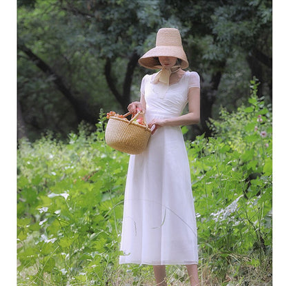 British lady's white vintage dress