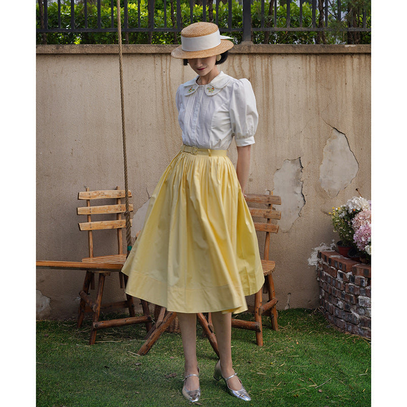 Pale yellow movie actress Hepburn skirt