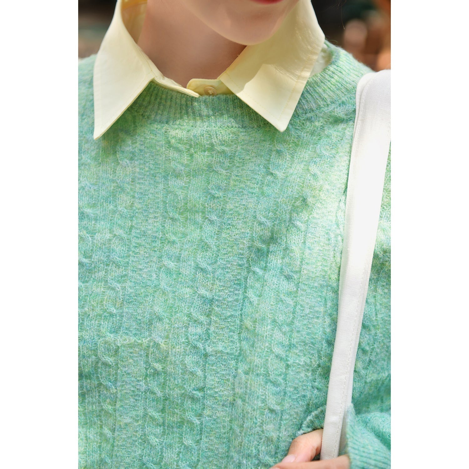 Aran knitted pale colored wool sweater