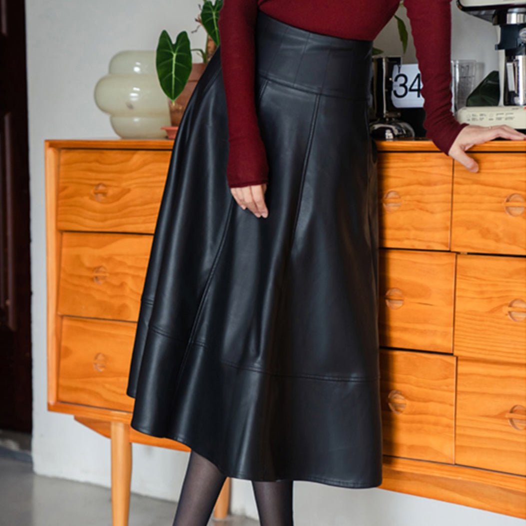 Jet-black lady's high-waisted leather skirt