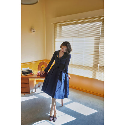 Navy blue actress retro jacket and Hepburn skirt