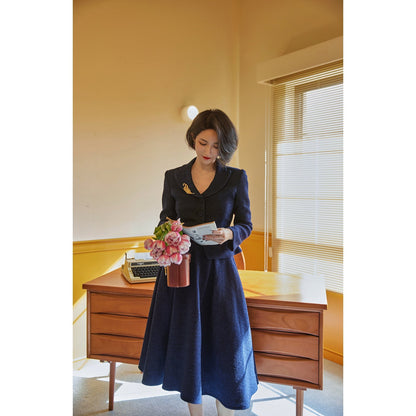 Navy blue actress retro jacket and Hepburn skirt