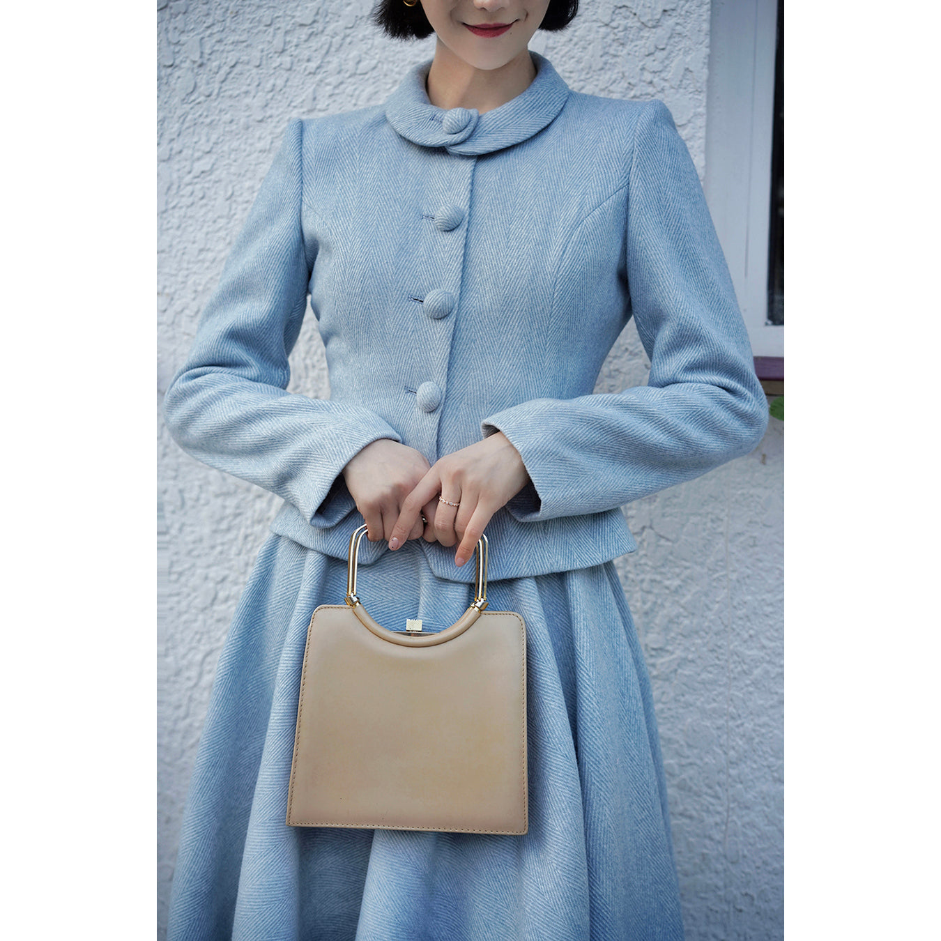 Light blue classic tweed jacket and tweed skirt