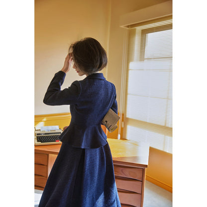 Navy blue actress retro jacket and Hepburn skirt