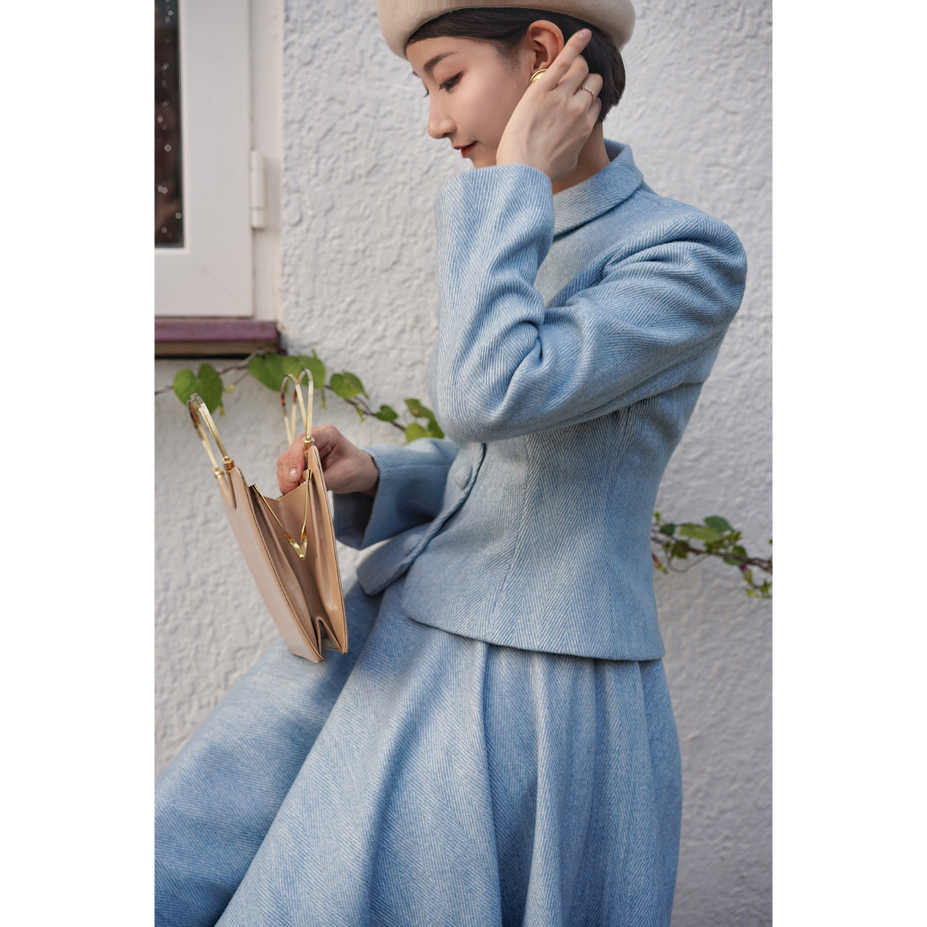 Light blue classic tweed jacket and tweed skirt