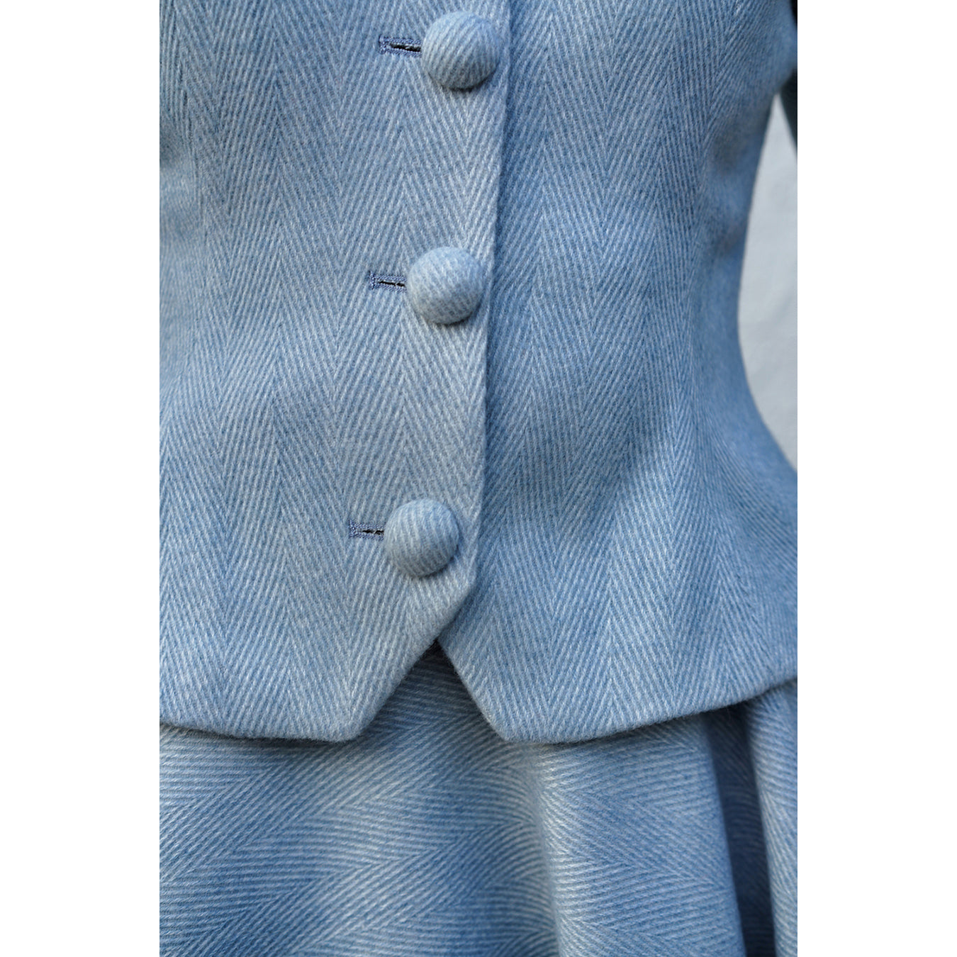 Light blue classic tweed jacket and tweed skirt