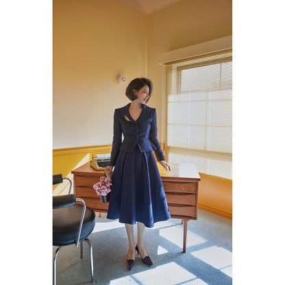 Navy blue actress retro jacket and Hepburn skirt