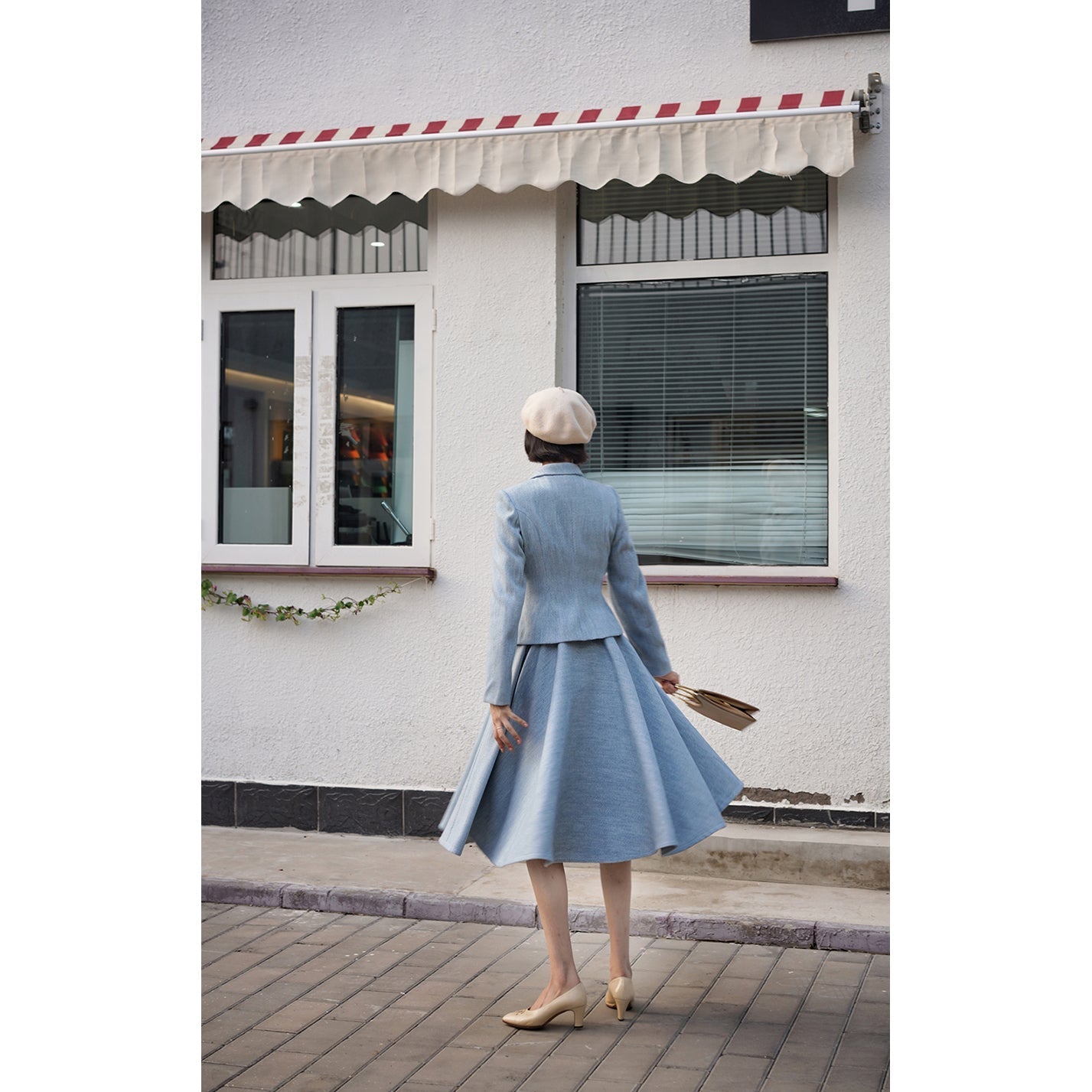 Light blue classic tweed jacket and tweed skirt