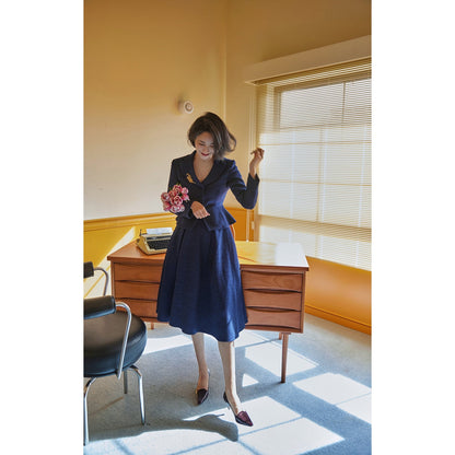 Navy blue actress retro jacket and Hepburn skirt