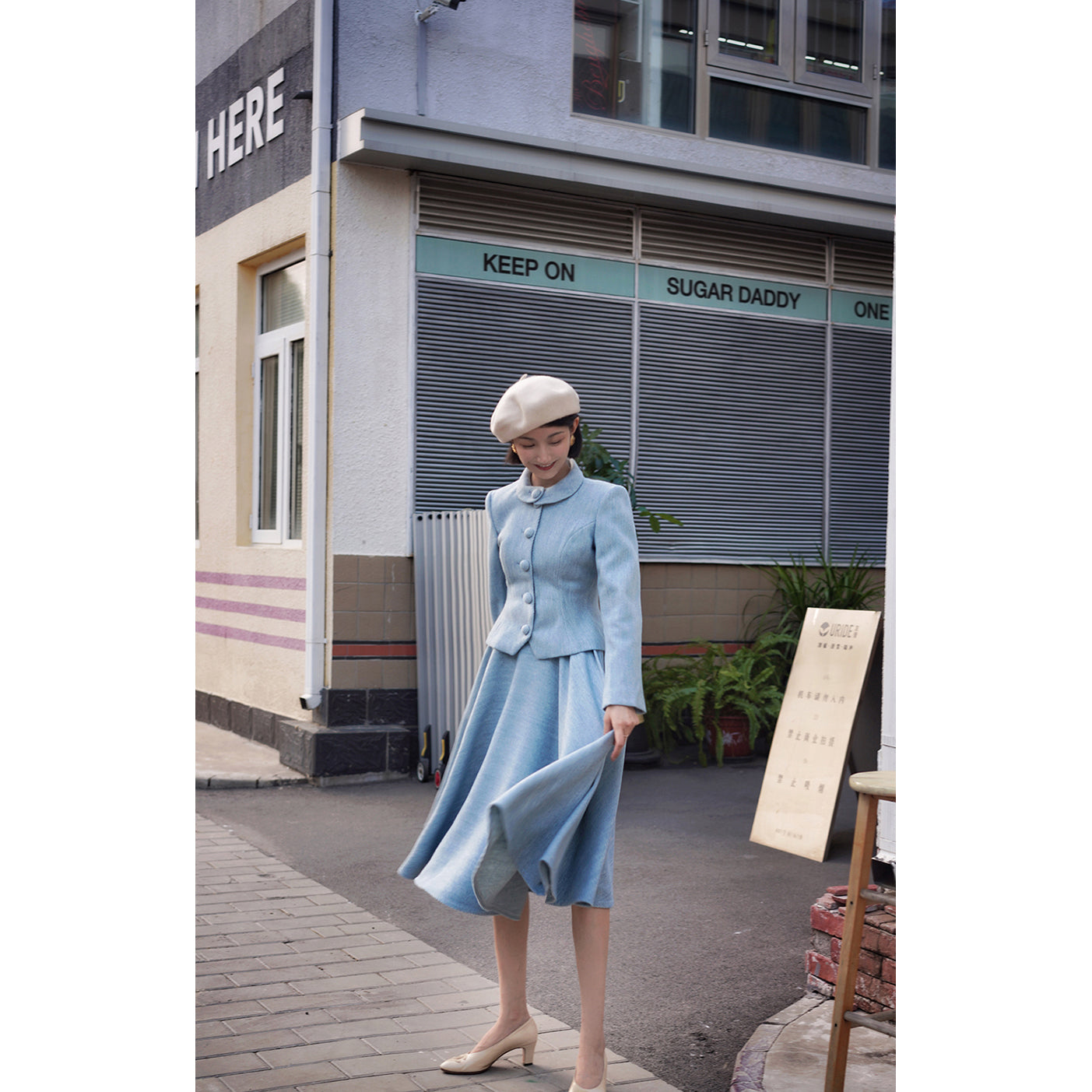 Light blue classic tweed jacket and tweed skirt