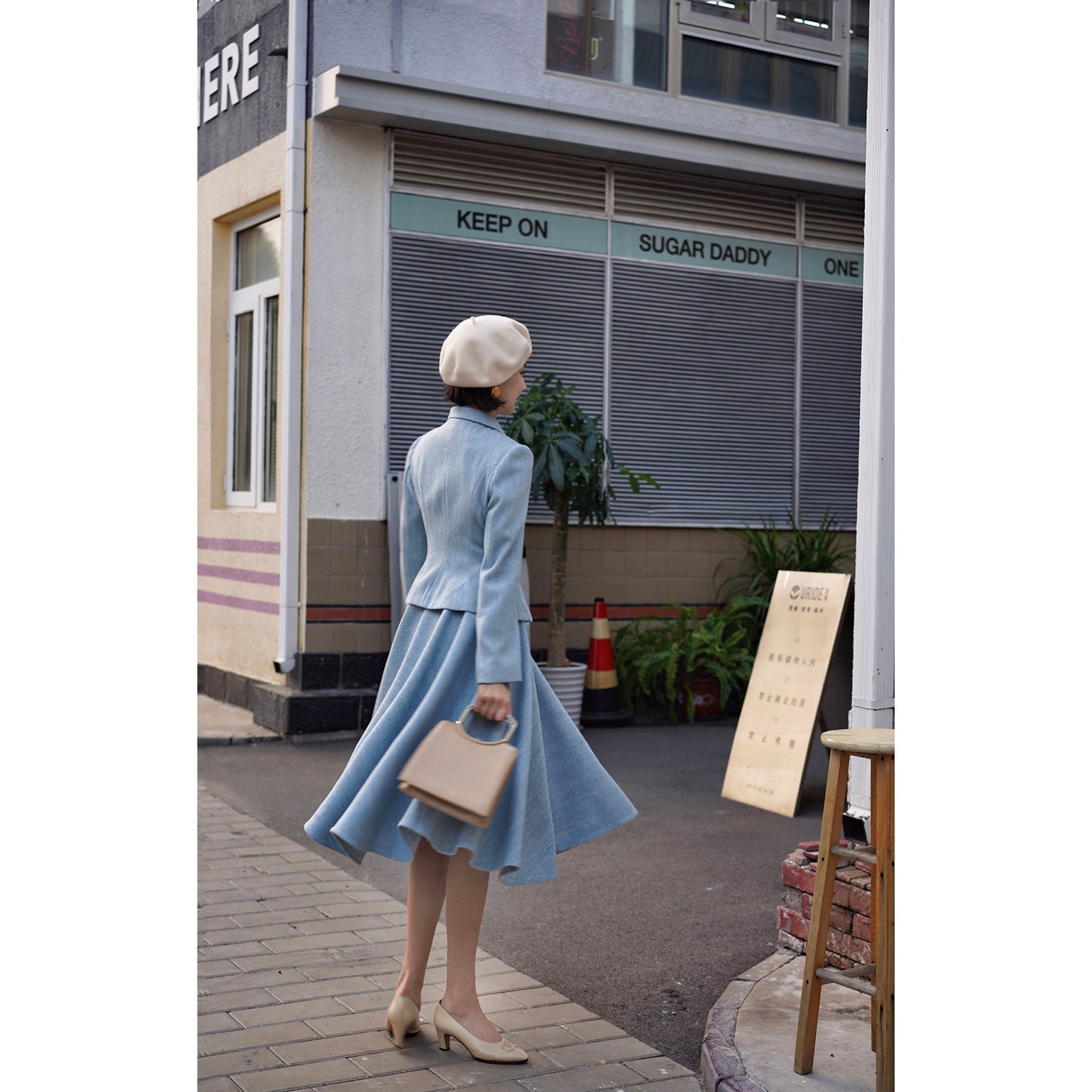 Light blue classic tweed jacket and tweed skirt