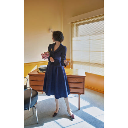 Navy blue actress retro jacket and Hepburn skirt