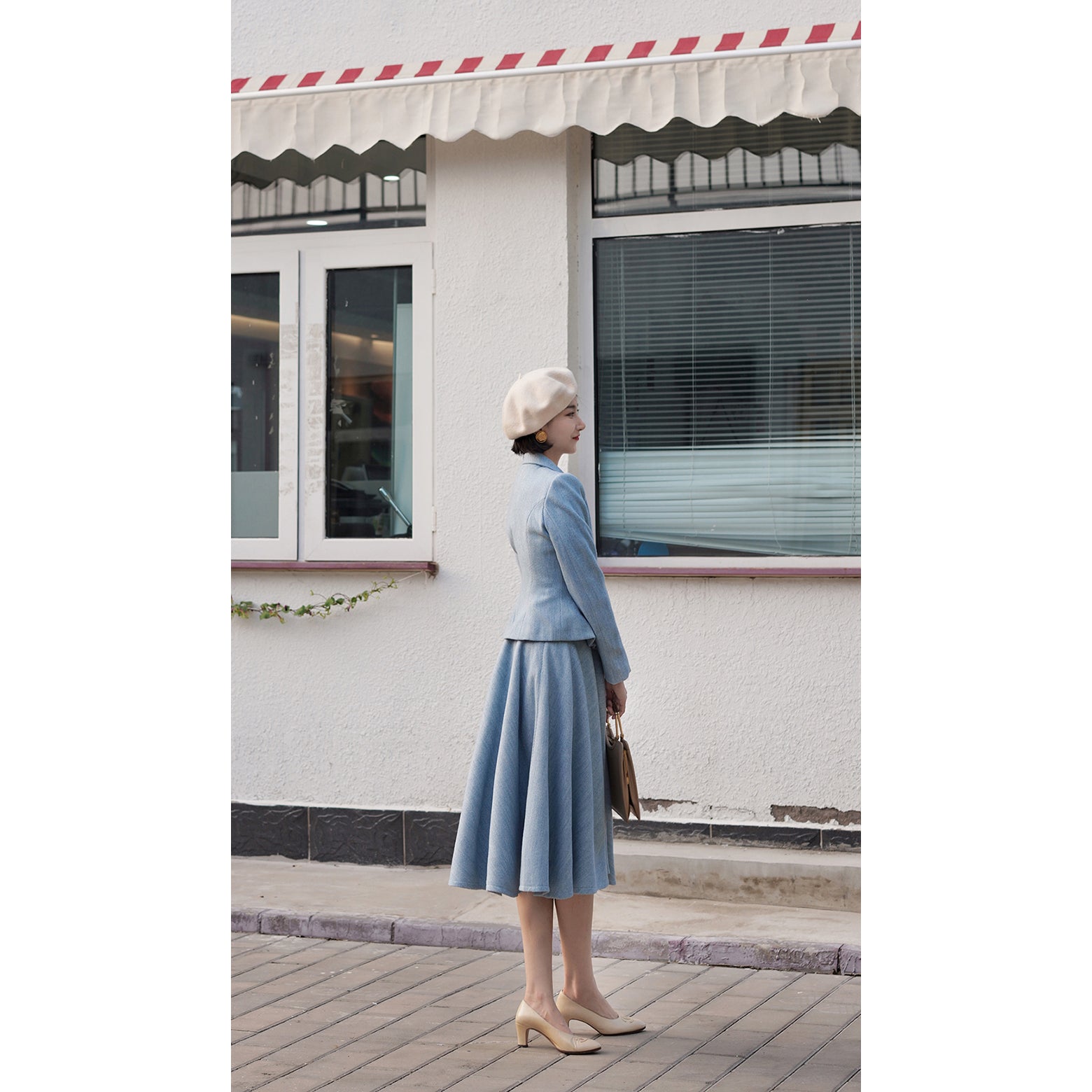 Light blue classic tweed jacket and tweed skirt