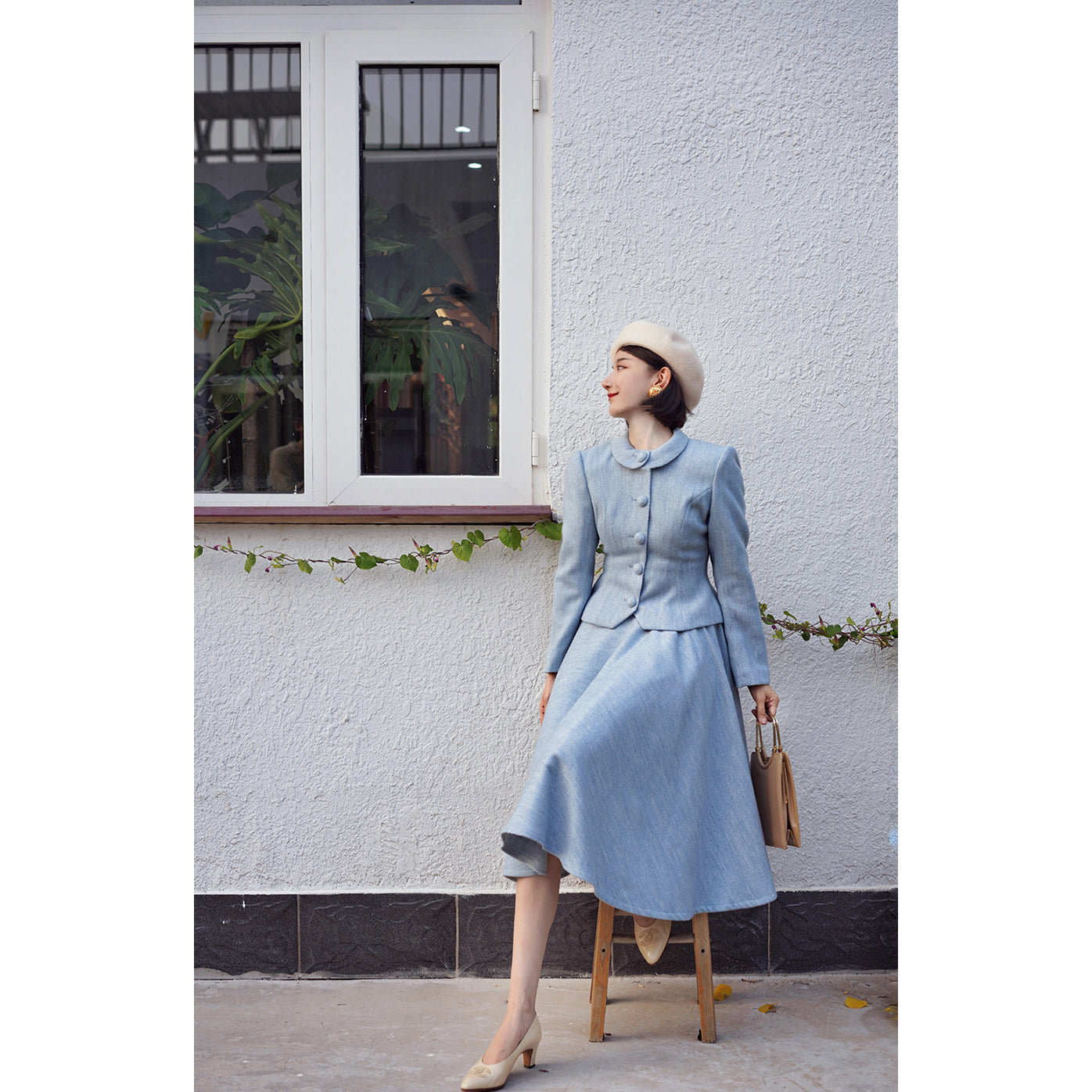 Light blue classic tweed jacket and tweed skirt