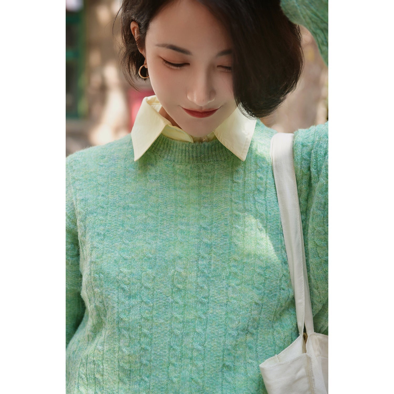 Aran knitted pale colored wool sweater