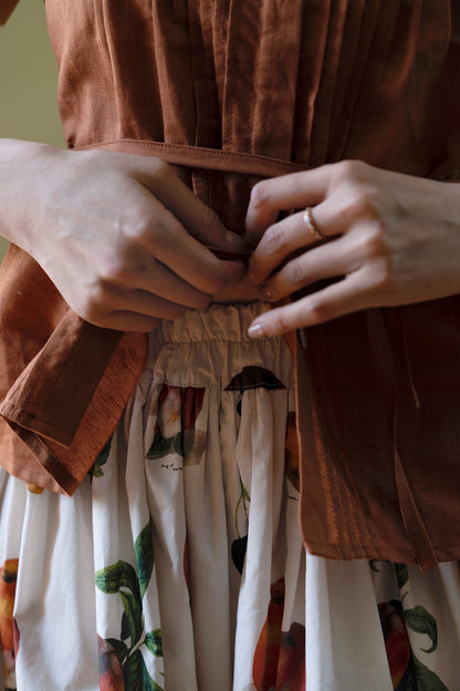 gray brown sleeveless pleated tops