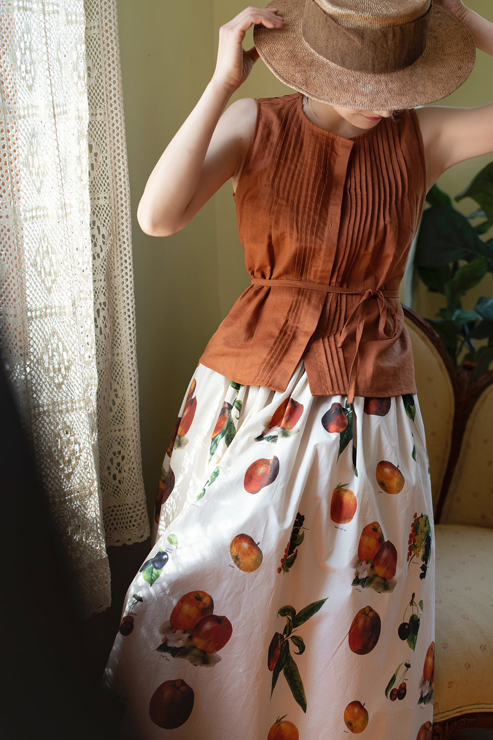 gray brown sleeveless pleated tops