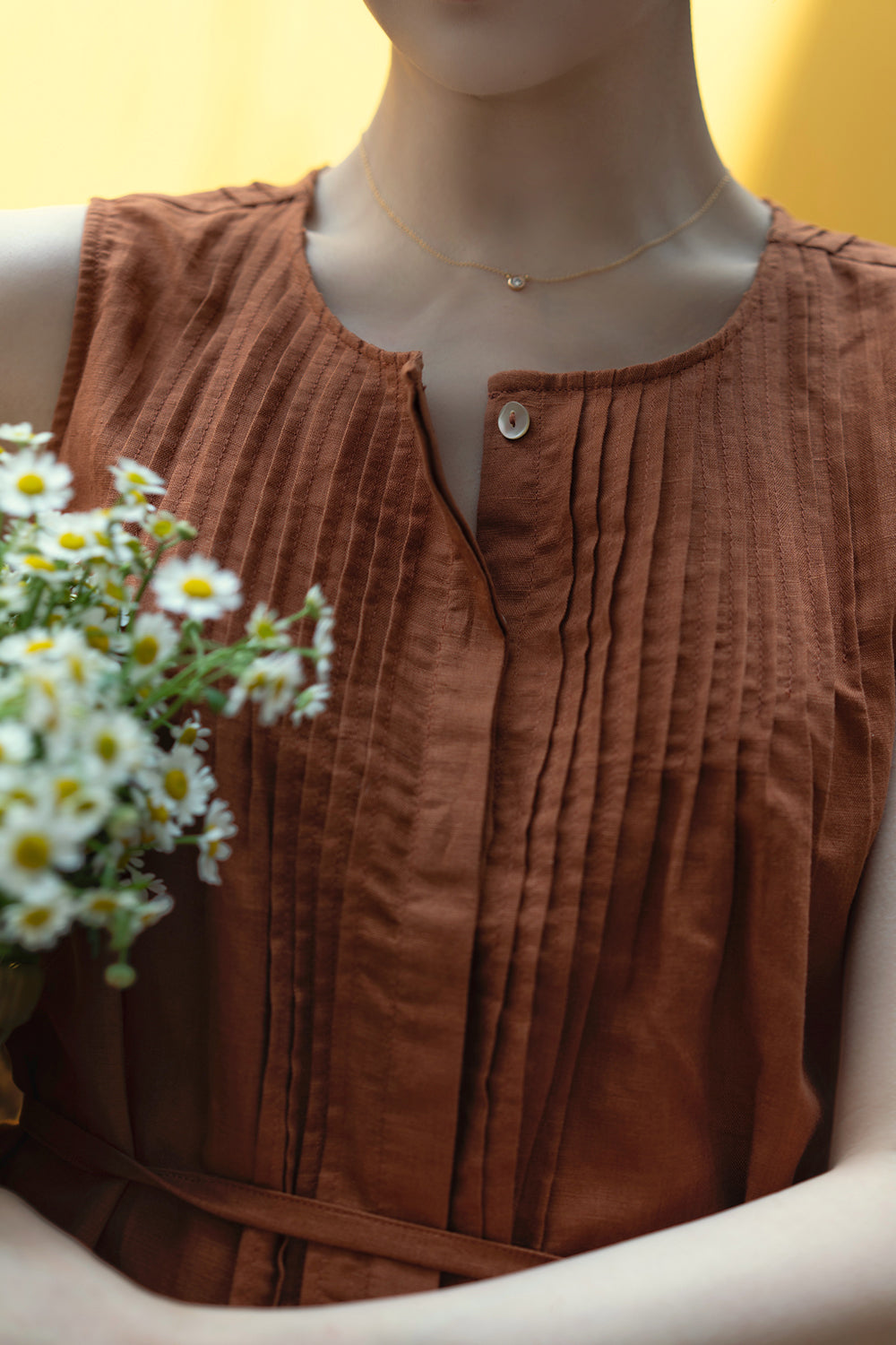 gray brown sleeveless pleated tops