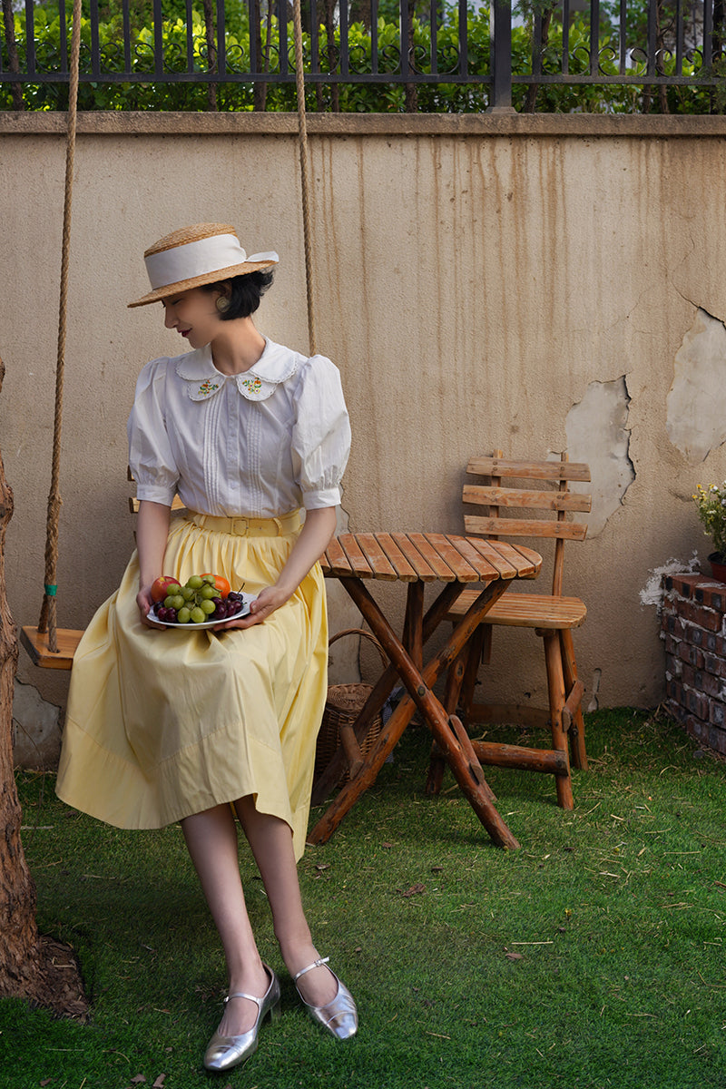 Pale yellow movie actress Hepburn skirt