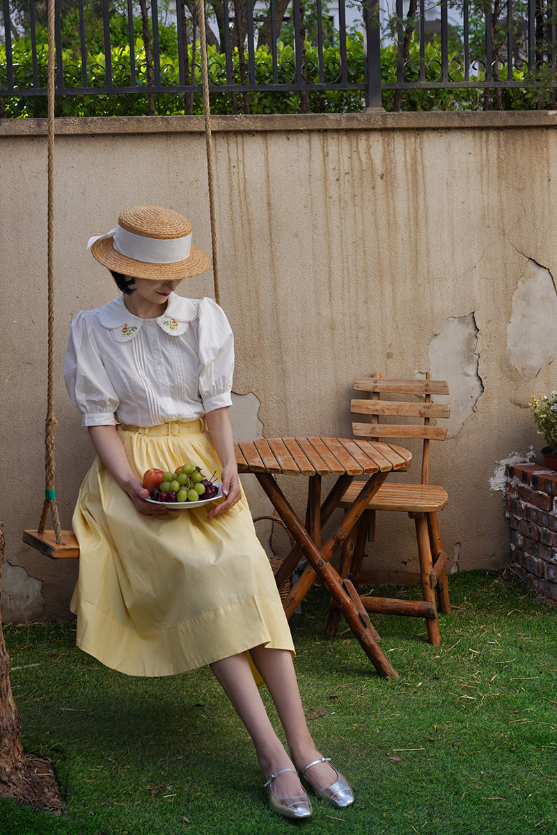 Pale yellow movie actress Hepburn skirt