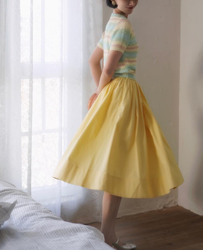 Pale yellow movie actress Hepburn skirt