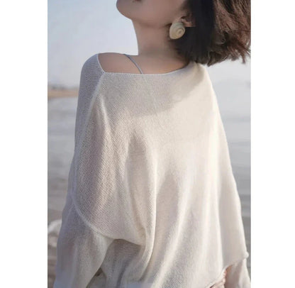 Melting see-through down shoulder knit