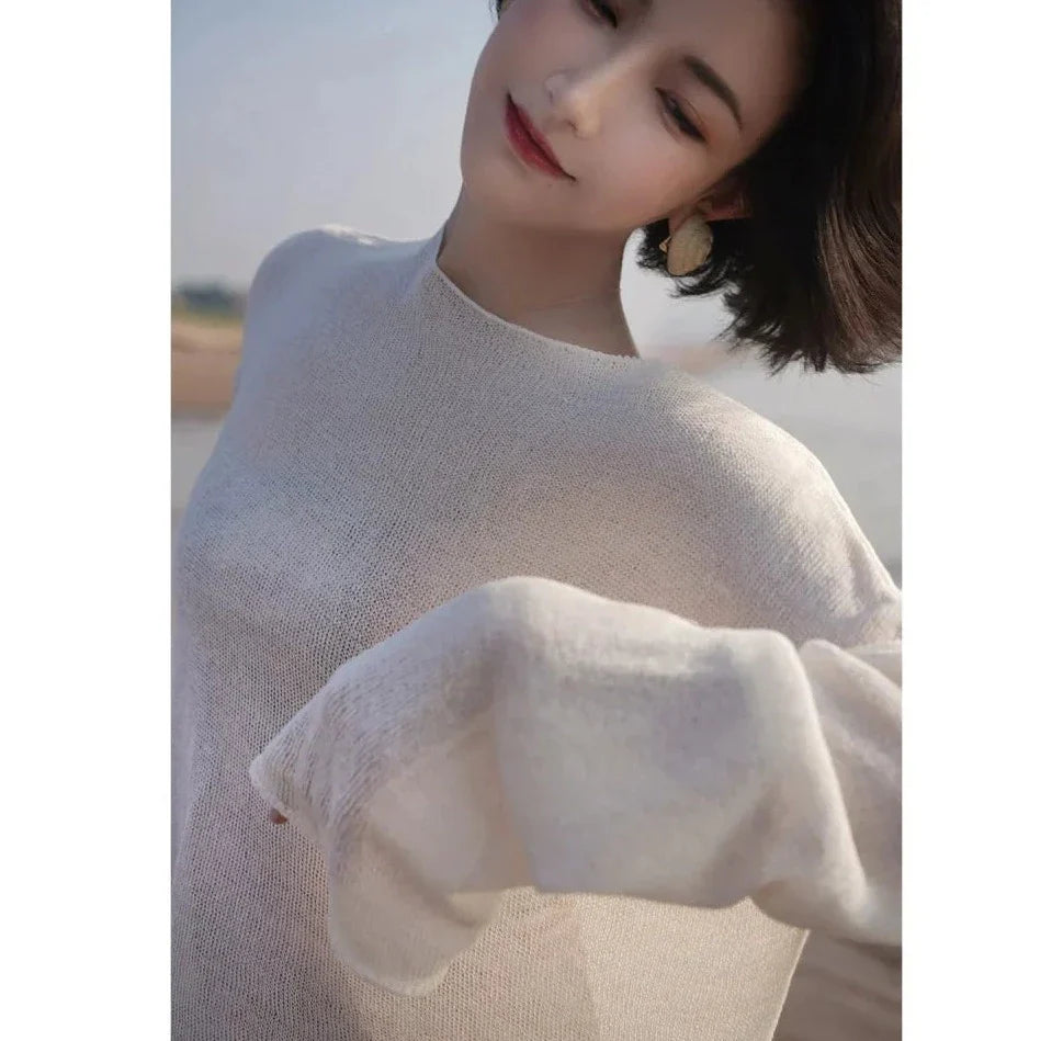 Melting see-through down shoulder knit